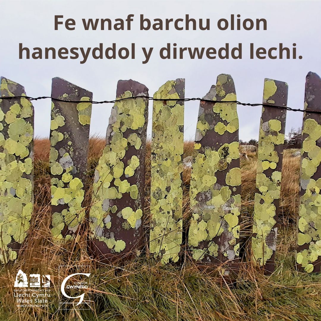 Slate fence with text: "I will respect the slate landscape's historic remains."